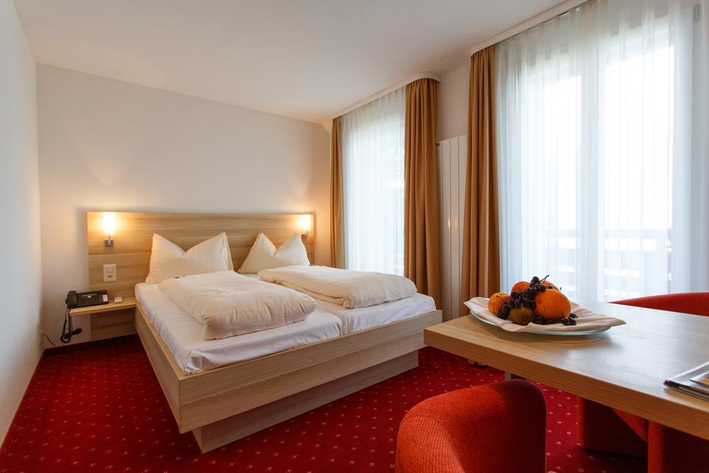 Hotel Kreuz Leissigen Pokoj fotografie